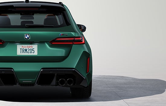 Rear shot of BMW M5 Touring showing the flared wheel arches. | BMW of Okemos in Okemos MI