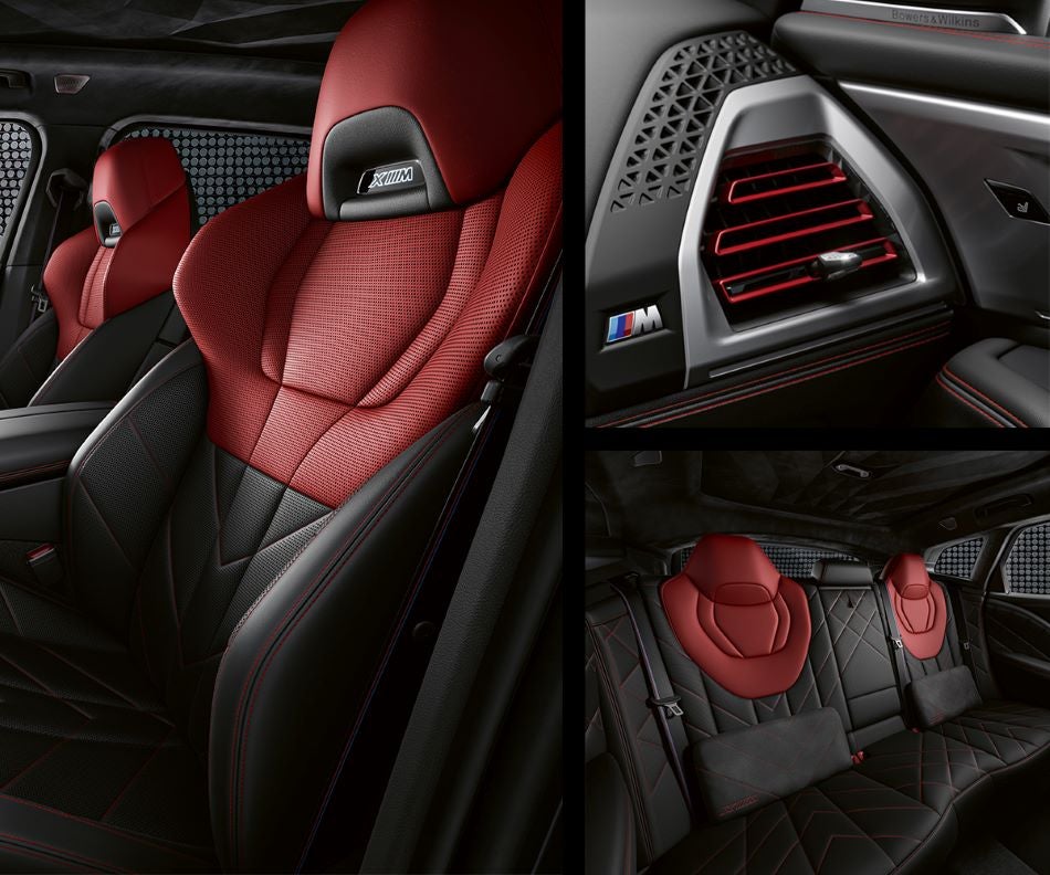 Detail of front seats, clad in exclusive BMW Individual Fiona Red & Black Merino Leather with exclusive M Signature Trim and red stitching and accents. Detail of red accented vent. Detail of rear M Lounge with exclusive XM pillows in BMW of Okemos | Okemos MI