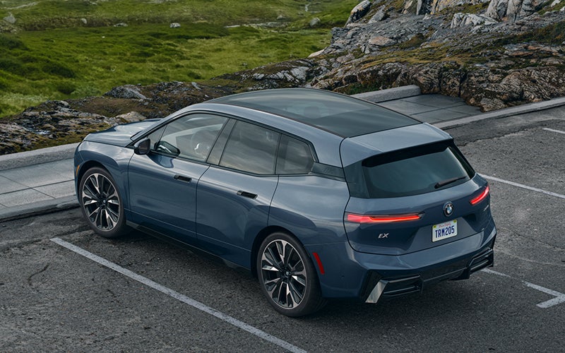 The BMW iX parked in a parking spot. | BMW of Okemos in Okemos MI